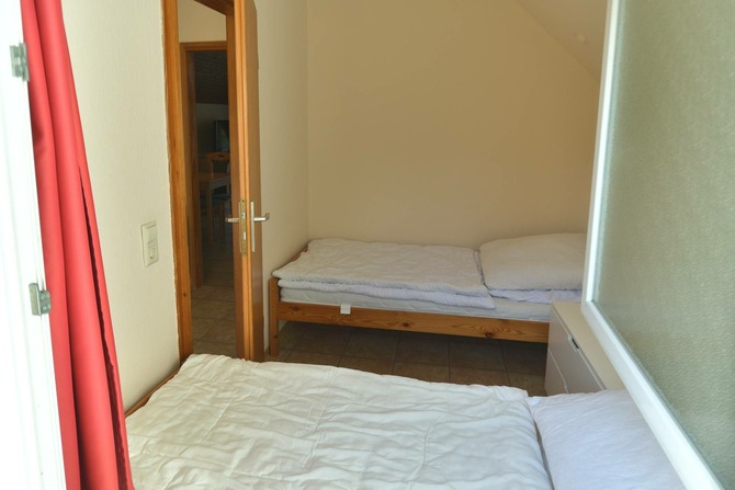 Appartement in Pelzerhaken - Am Waldrand - Schlafzimmer mit zwei Einzelbetten