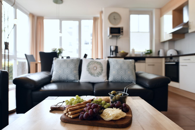 Ferienwohnung in Großenbrode - Windrose 2 - Wohnbereich mit gemütlicher Couch