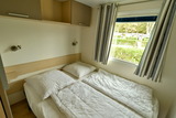 Ferienhaus in Pelzerhaken - Mobilheim Mediterranee - Schlafzimmer mit Doppelbett