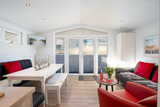 Ferienhaus in Scharbeutz - Casa del Sol Scharbeutz - Ferienhaus mit Sauna & umz&auml;untem Garten - Bild 6