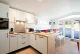 Ferienhaus in Scharbeutz - Casa del Sol Scharbeutz - Ferienhaus mit Sauna & umz&auml;untem Garten - Bild 11