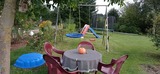 Ferienwohnung in Schönwalde - Hügelkate in Vogelsang - Spielplatz und Sitzgelegenheit