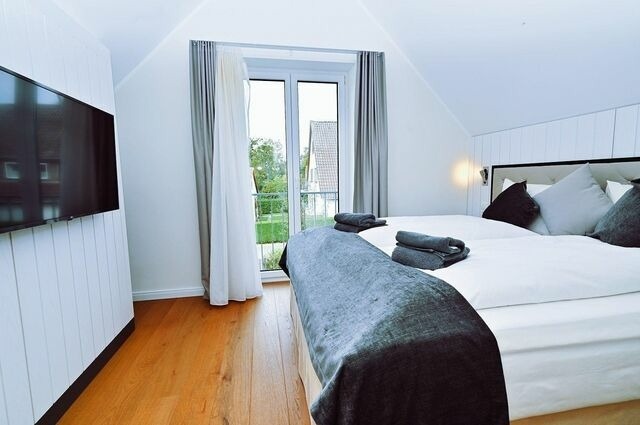 Ferienhaus in Hohwacht - M&ouml;wenweg Die Strandburg im M&ouml;wenweg App. 3 - Bild 12